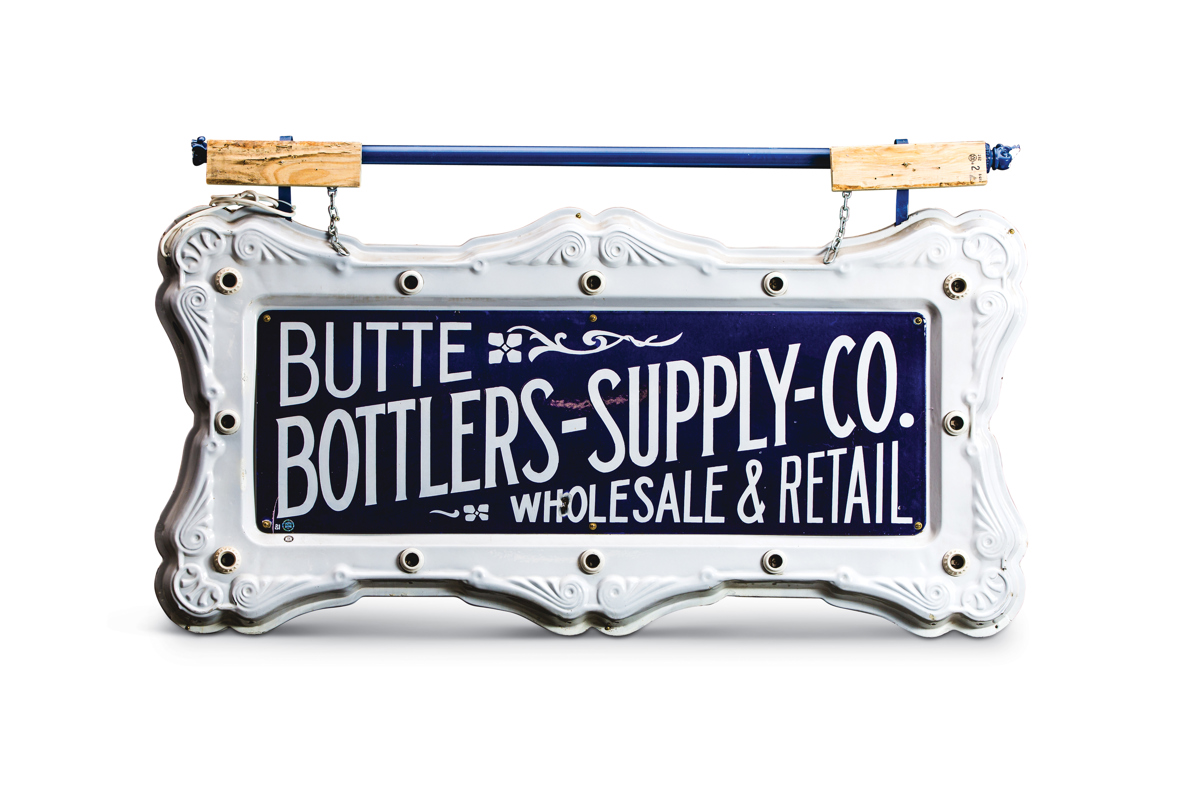 Butte Bottlers Supply Co. Wholesale & Retail Signs in Ornate Porcelain Frame offered at RM Auctions’ Auburn Spring 2019